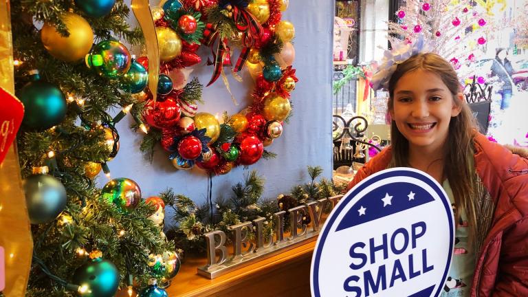 young girl shopping at a small businesses during the holidays
