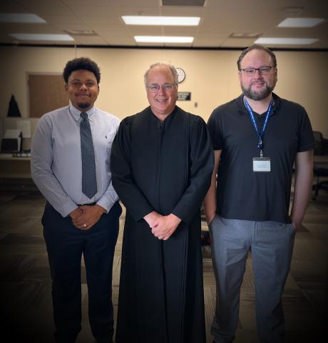Chief Judge Biernat pictured with Self-Help Center staff Tyler Hunt and Daryl Schmidt